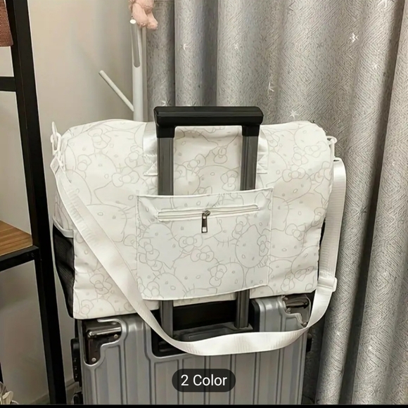 Sanrio Hello Kitty travel bag. Color: White with grey Hello Kitty designs throug - Picture 9 of 13